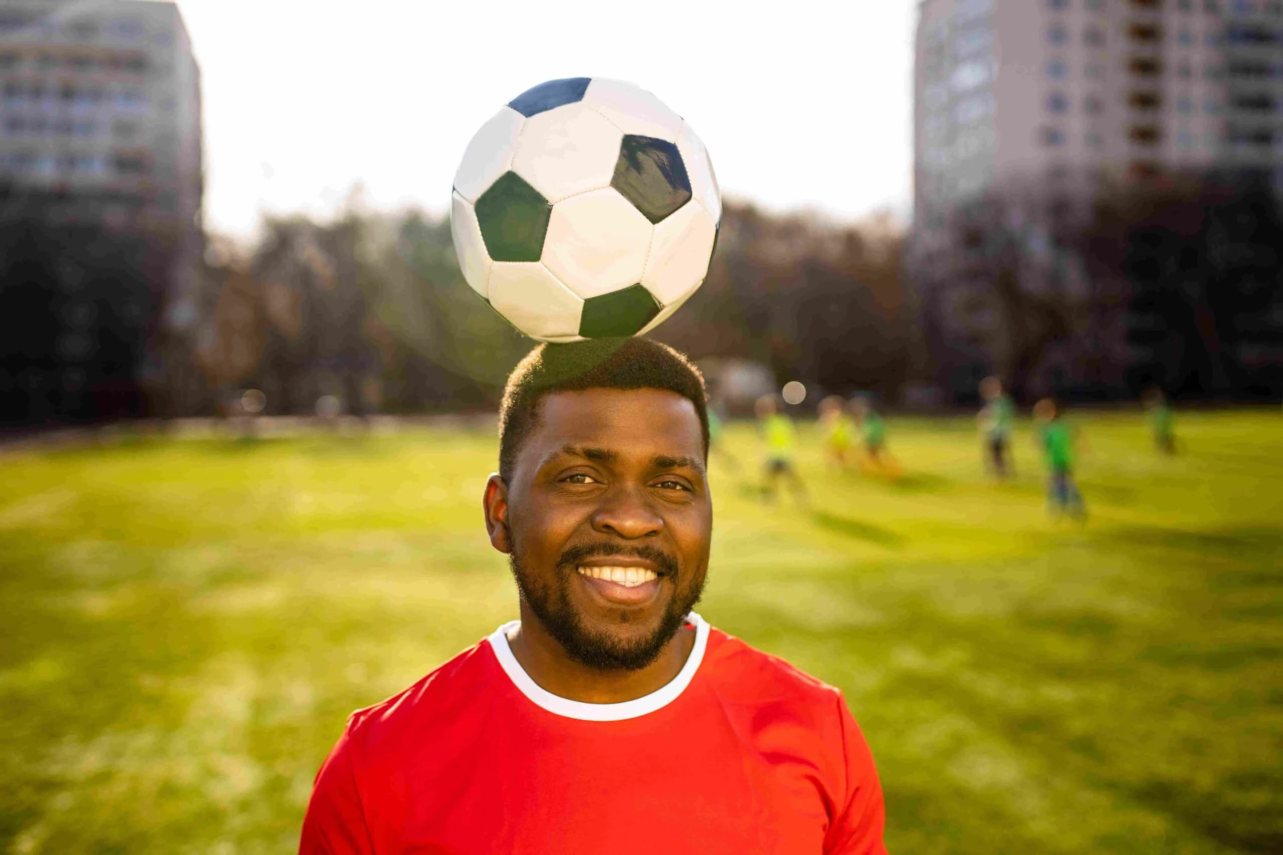 Soccer athlete performing on stadium field